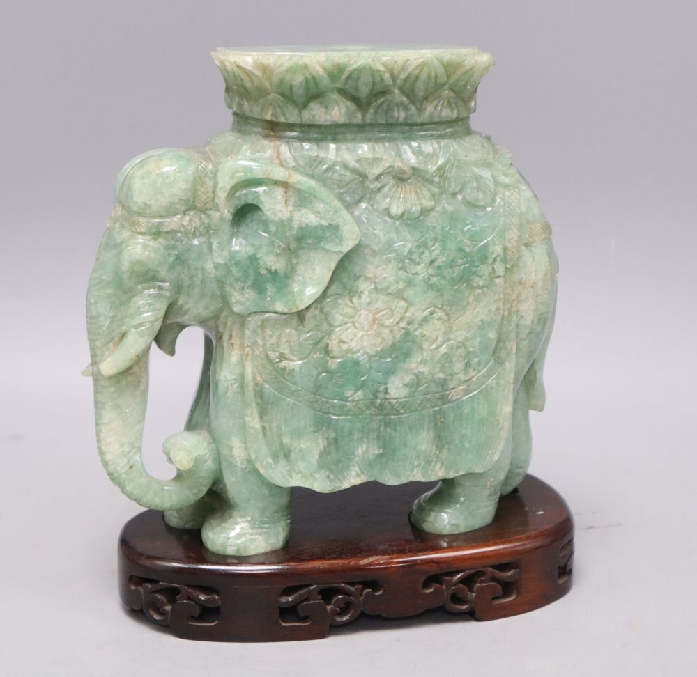 A large Chinese stone carving of elephant, with wood stand, overall 26cm